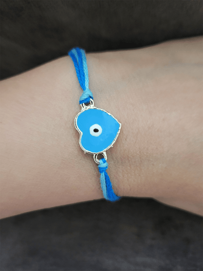 Heart shaped evil eye rakhi - Odara Jewellery