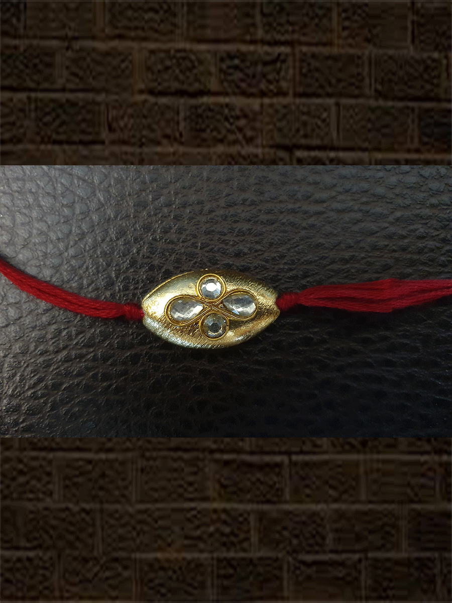 Oval gold bead red thread kundan rakhi - Odara Jewellery