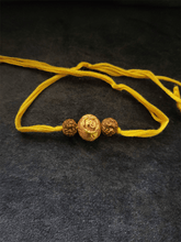 Load image into Gallery viewer, Geru round bead with rudraksh rakhi - Odara Jewellery
