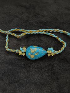 Leaf shaped ferozi brown rakhi with side cluster bead - Odara Jewellery