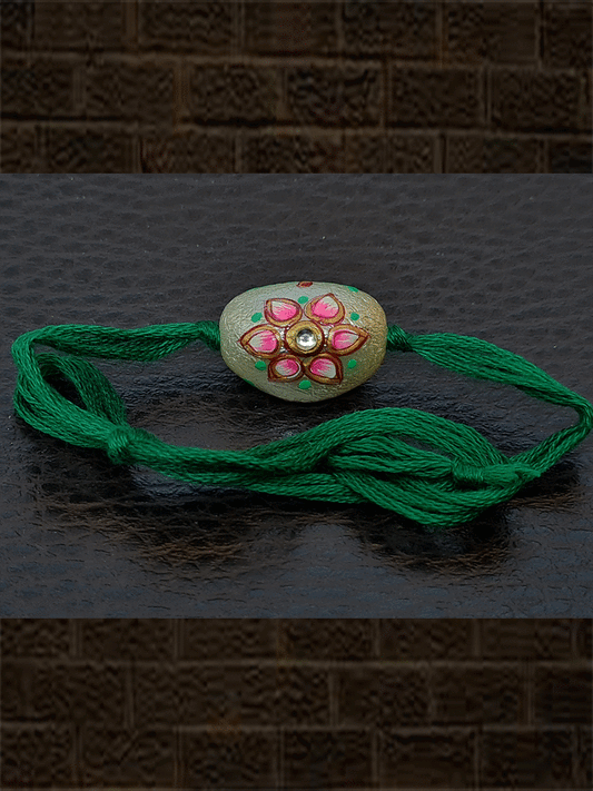 White bead with hand painted pink flower kundan green thread rakhi - Odara Jewellery