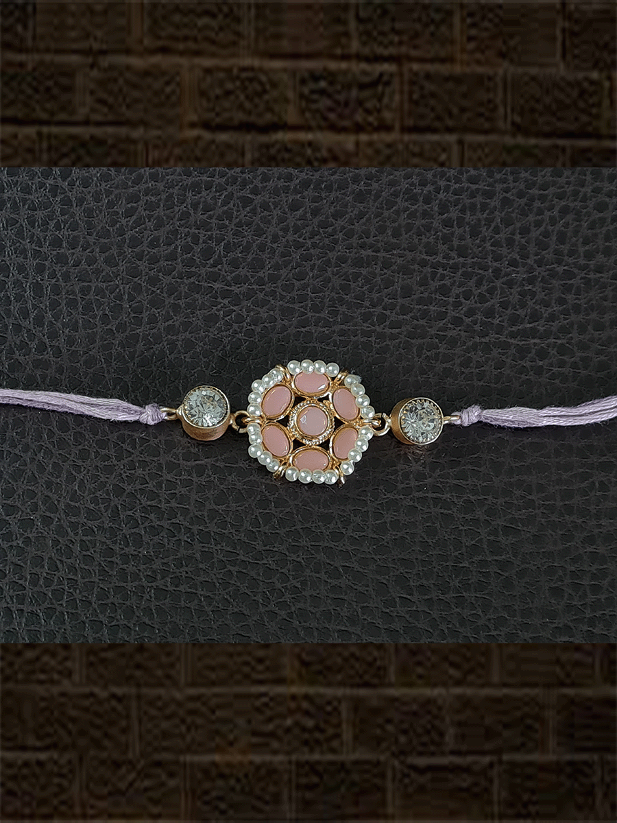 Light pink stones pirohi work flower shaped rakhi - Odara Jewellery