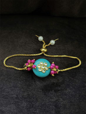Ferozi round bead with kundan flower and pink bead cluster on both sides bhabhi rakhi - Odara Jewellery