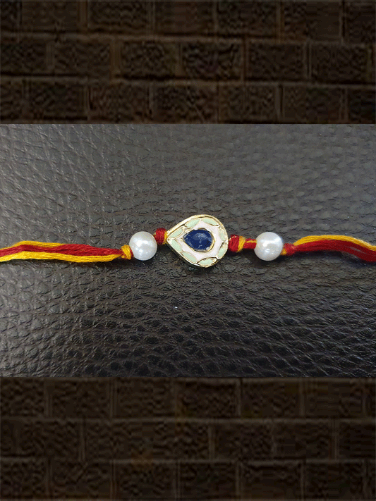Light green enamel and navy blue stone rakhi - Odara Jewellery