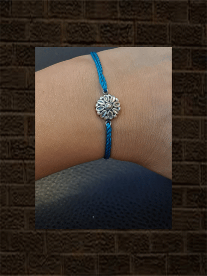 Ferozi thread oxidised flower design sterling silver rakhi - Odara Jewellery