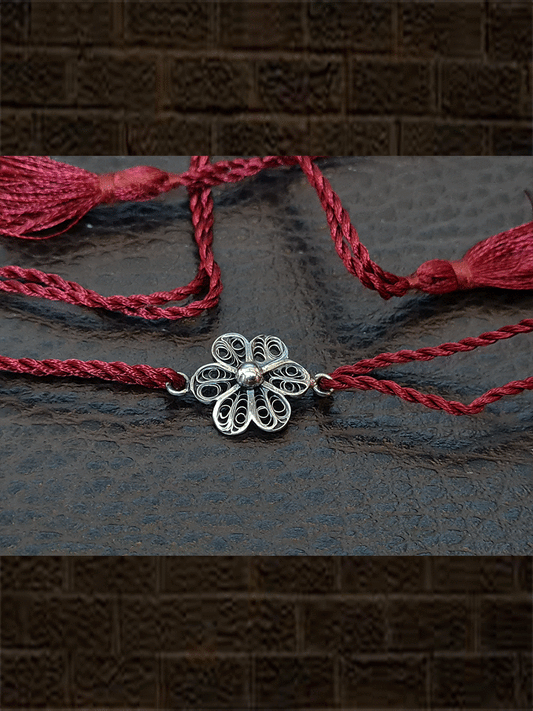 Maroon thread oxidised flower design sterling silver rakhi - Odara Jewellery