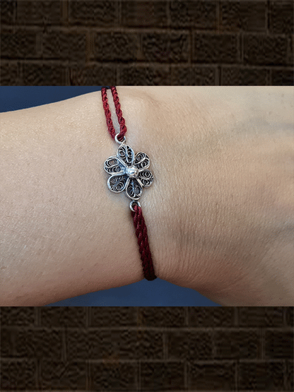 Maroon thread oxidised flower design sterling silver rakhi - Odara Jewellery