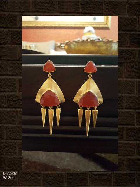 Orange coloured stone earring with three spikes