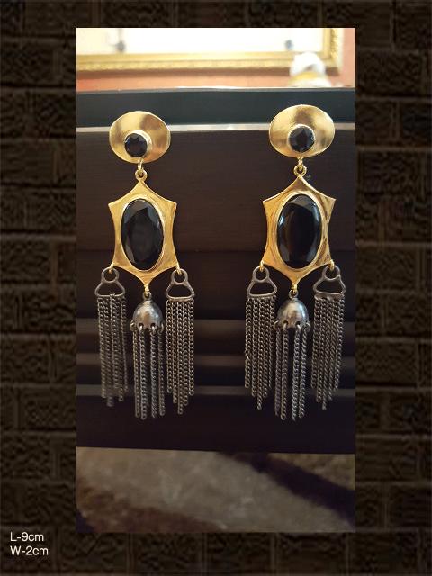 Stylish black stone earrings with gold and black polish