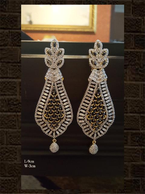 Elegant long black AD earring with intricate design