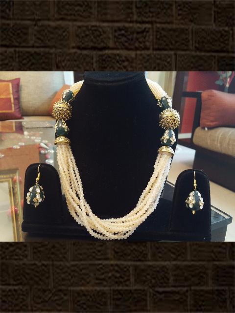 Peach acrylic beads multi string neckpiece with beautiful intricate mehandi colour kundan beads and matching earrings