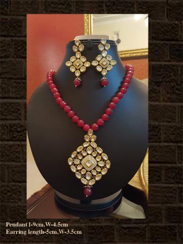 Rhombus shaped kundan and AD pendant set in ruby string&nbsp;