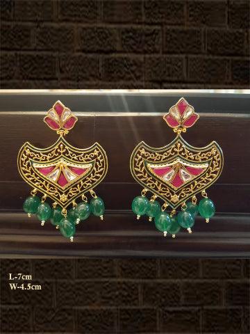 Emerald drops rani and kundan earring with intricate design