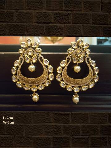 Matt finish intricate carving kundan and AD earring