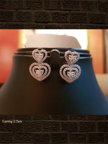 Heart shape AD earring with silver polish