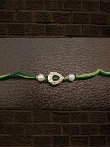 Bead with Light green enamel and green stone rakhi - Odara Jewellery
