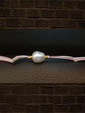 White bead rakhi in white and pink thread - Odara Jewellery