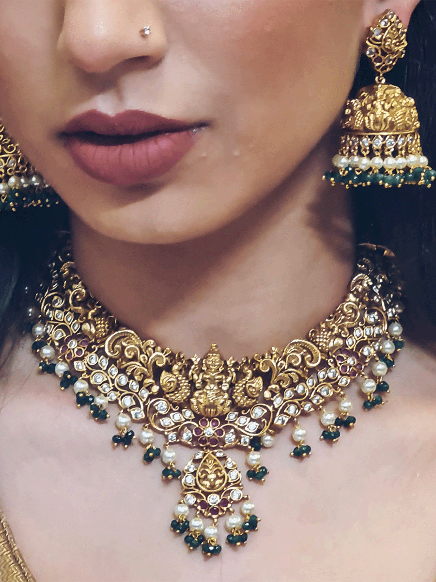 Intricate design polki ,ruby and green stones studded laxmiji set with pearl and green bead drops - Odara Jewellery
