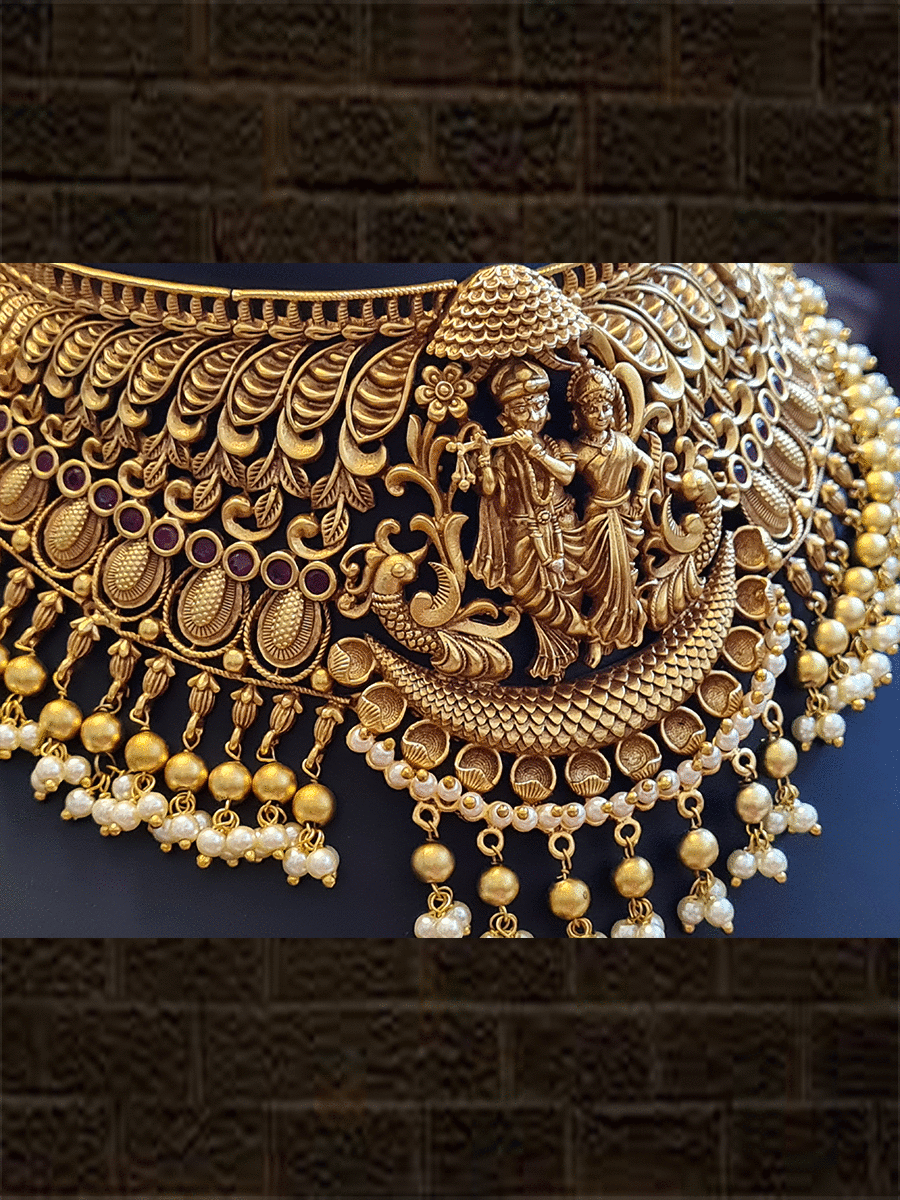Radha krishna broad set with ruby stones and leaf design and pearly hangings - Odara Jewellery