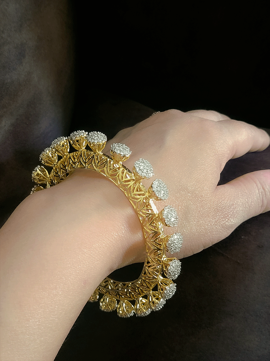 Set of two zircon studded pacheli kadas