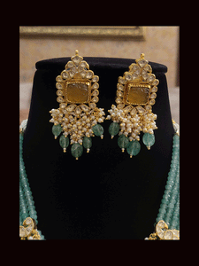Five jade strings with paachi kundan peacock design tukdies on string and citrine stone pendant set